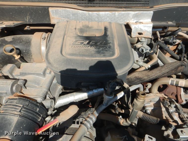 image for item DJ8993 2015 Chevrolet Silverado 3500HD  Crew Cab flatbed pickup truck