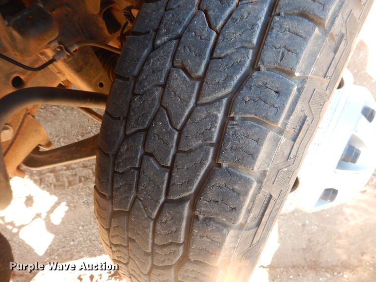 image for item DJ8993 2015 Chevrolet Silverado 3500HD  Crew Cab flatbed pickup truck