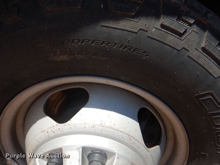 image for item DJ8993 2015 Chevrolet Silverado 3500HD  Crew Cab flatbed pickup truck