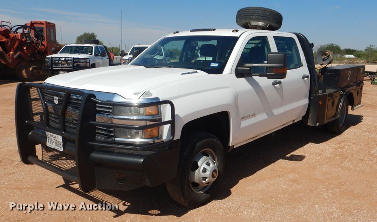 image for item DJ8996 2015 Chevrolet Silverado 3500HD  Crew Cab flatbed pickup truck