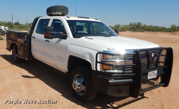 image for item DJ8996 2015 Chevrolet Silverado 3500HD  Crew Cab flatbed pickup truck