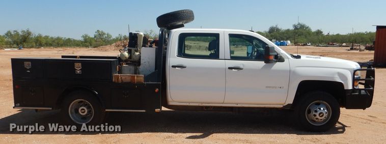 image for item DJ8996 2015 Chevrolet Silverado 3500HD  Crew Cab flatbed pickup truck