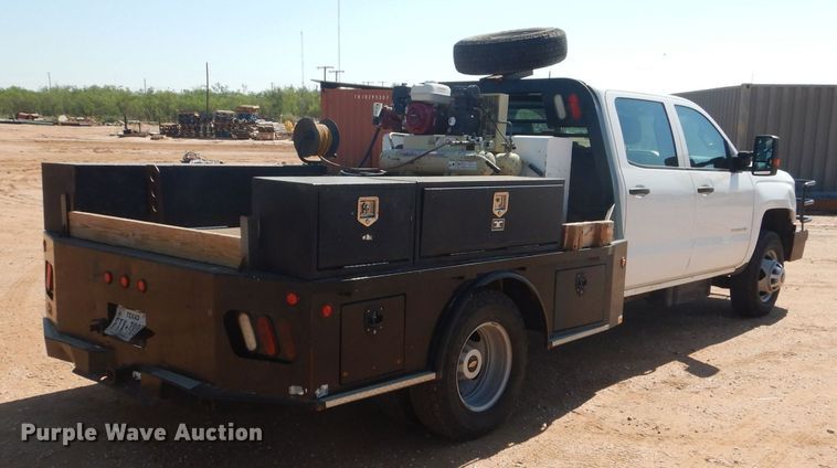 image for item DJ8996 2015 Chevrolet Silverado 3500HD  Crew Cab flatbed pickup truck