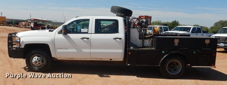 image for item DJ8996 2015 Chevrolet Silverado 3500HD  Crew Cab flatbed pickup truck