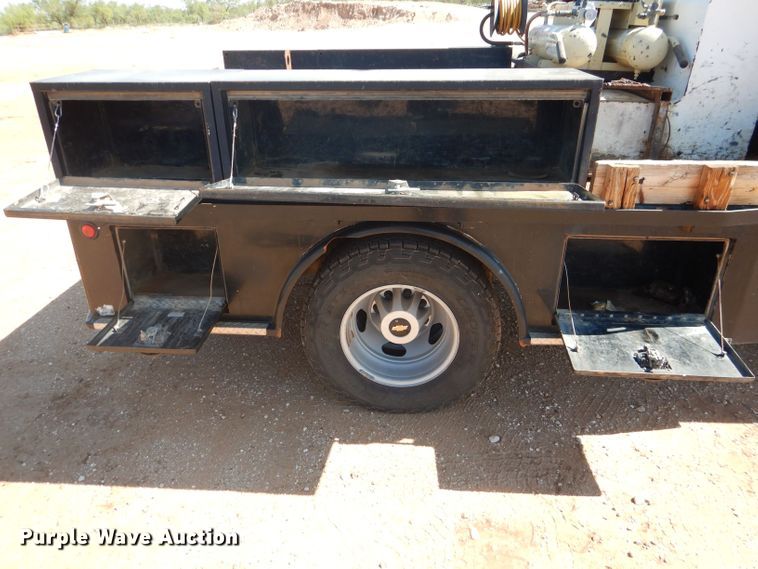 image for item DJ8996 2015 Chevrolet Silverado 3500HD  Crew Cab flatbed pickup truck