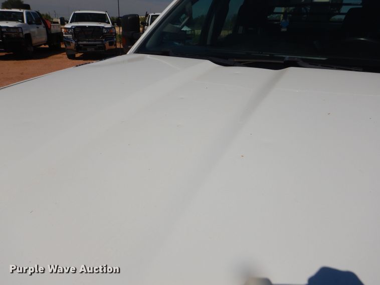 image for item DJ8996 2015 Chevrolet Silverado 3500HD  Crew Cab flatbed pickup truck