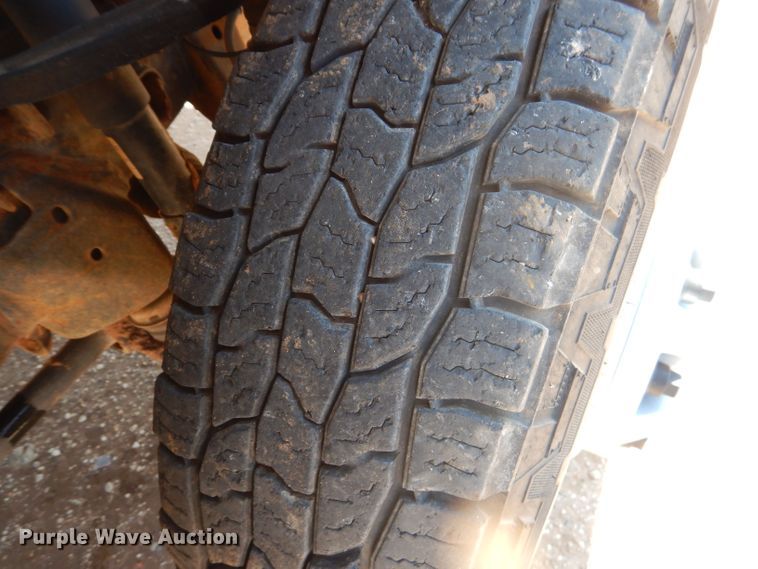 image for item DJ8996 2015 Chevrolet Silverado 3500HD  Crew Cab flatbed pickup truck