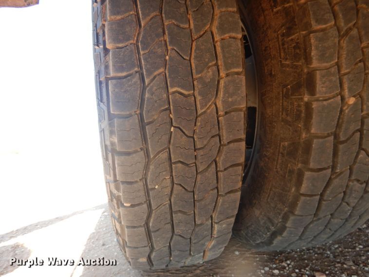 image for item DJ8996 2015 Chevrolet Silverado 3500HD  Crew Cab flatbed pickup truck