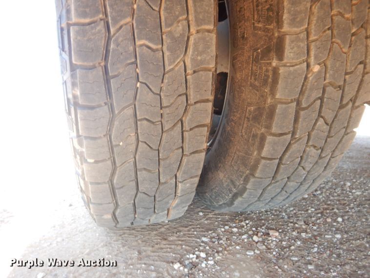 image for item DJ8996 2015 Chevrolet Silverado 3500HD  Crew Cab flatbed pickup truck