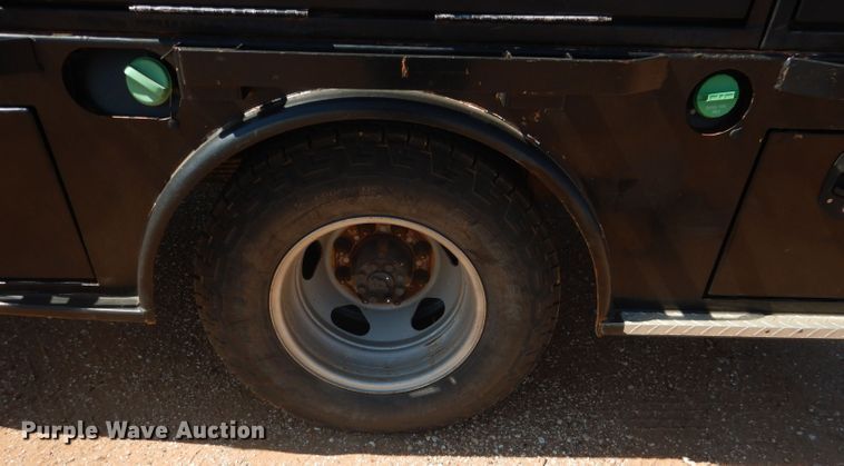 image for item DJ8996 2015 Chevrolet Silverado 3500HD  Crew Cab flatbed pickup truck