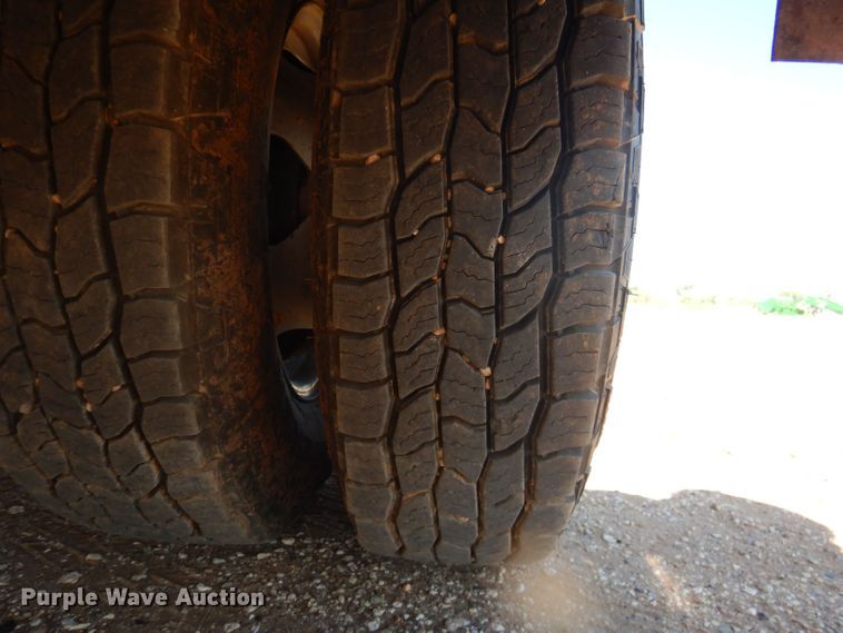 image for item DJ8996 2015 Chevrolet Silverado 3500HD  Crew Cab flatbed pickup truck