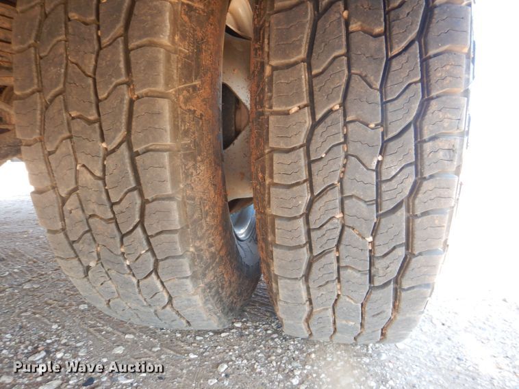 image for item DJ8996 2015 Chevrolet Silverado 3500HD  Crew Cab flatbed pickup truck