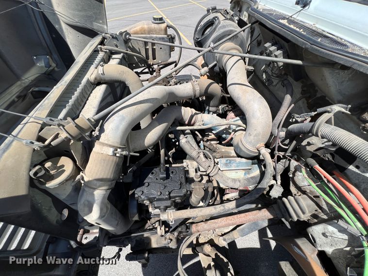 image for item IA9102 2000 International 4700  asphalt patch truck