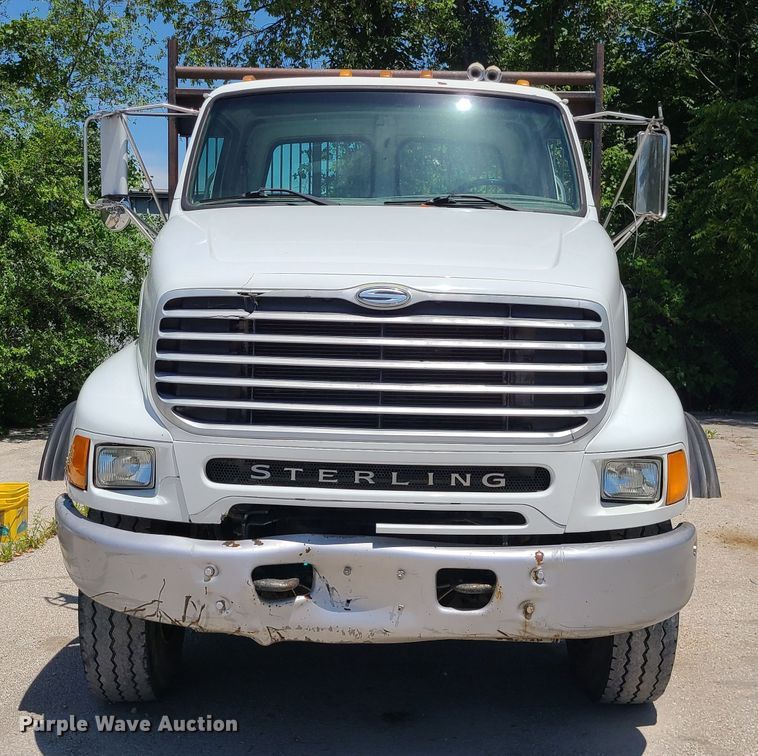 image for item JA9878 2004 Sterling L-Line  dump flatbed truck