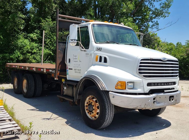 image for item JA9878 2004 Sterling L-Line  dump flatbed truck