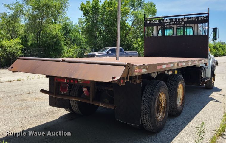 image for item JA9878 2004 Sterling L-Line  dump flatbed truck