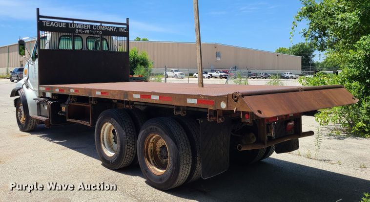 image for item JA9878 2004 Sterling L-Line  dump flatbed truck