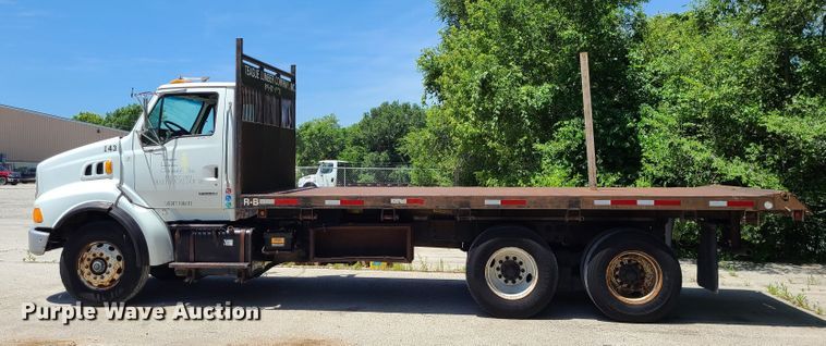 image for item JA9878 2004 Sterling L-Line  dump flatbed truck