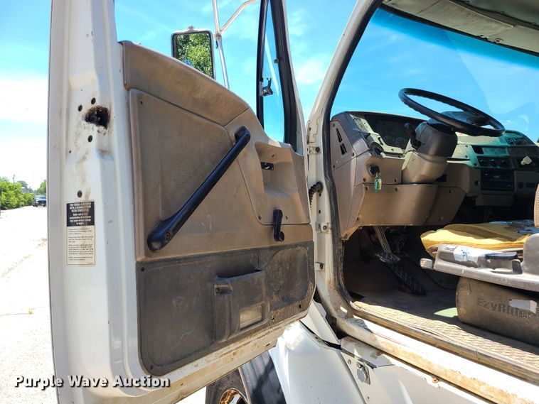 image for item JA9878 2004 Sterling L-Line  dump flatbed truck