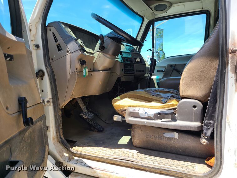 image for item JA9878 2004 Sterling L-Line  dump flatbed truck