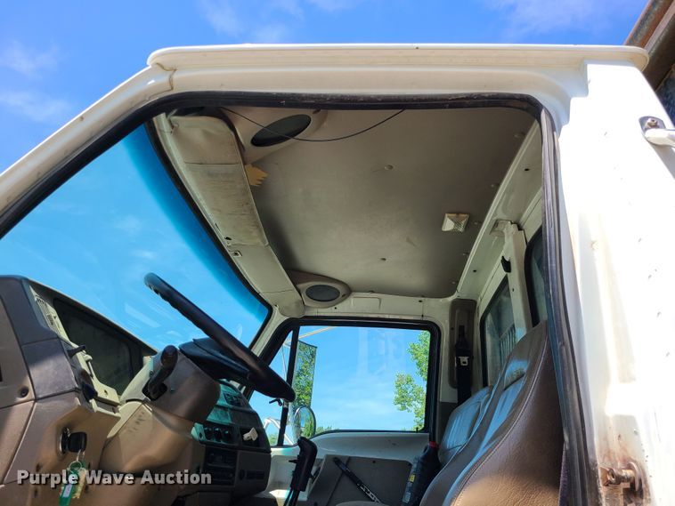 image for item JA9878 2004 Sterling L-Line  dump flatbed truck