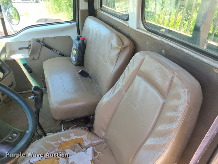 image for item JA9878 2004 Sterling L-Line  dump flatbed truck