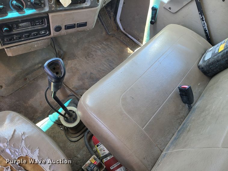 image for item JA9878 2004 Sterling L-Line  dump flatbed truck