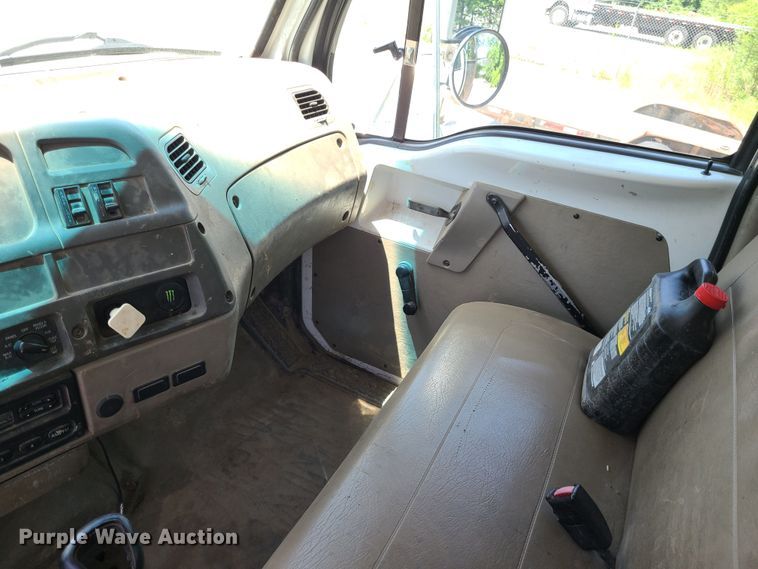 image for item JA9878 2004 Sterling L-Line  dump flatbed truck