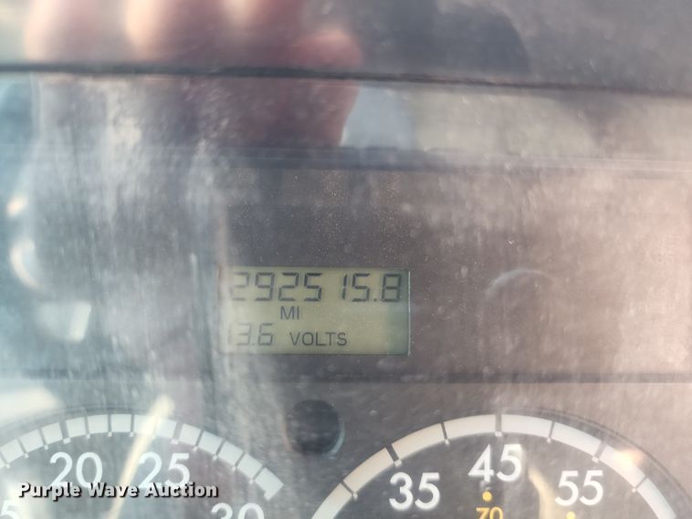 image for item JA9878 2004 Sterling L-Line  dump flatbed truck