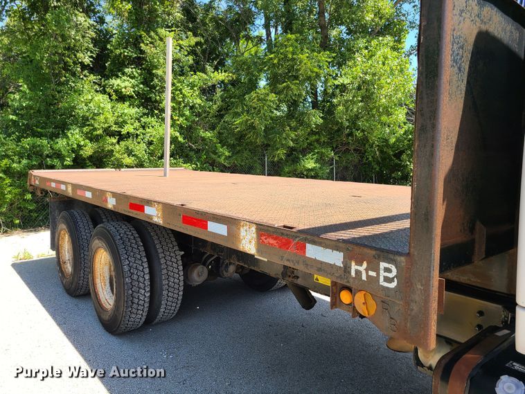 image for item JA9878 2004 Sterling L-Line  dump flatbed truck