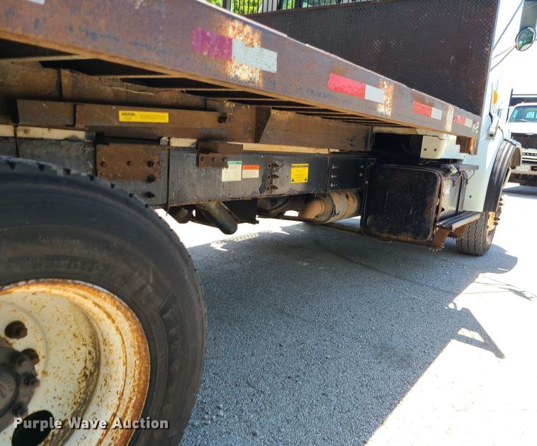 image for item JA9878 2004 Sterling L-Line  dump flatbed truck