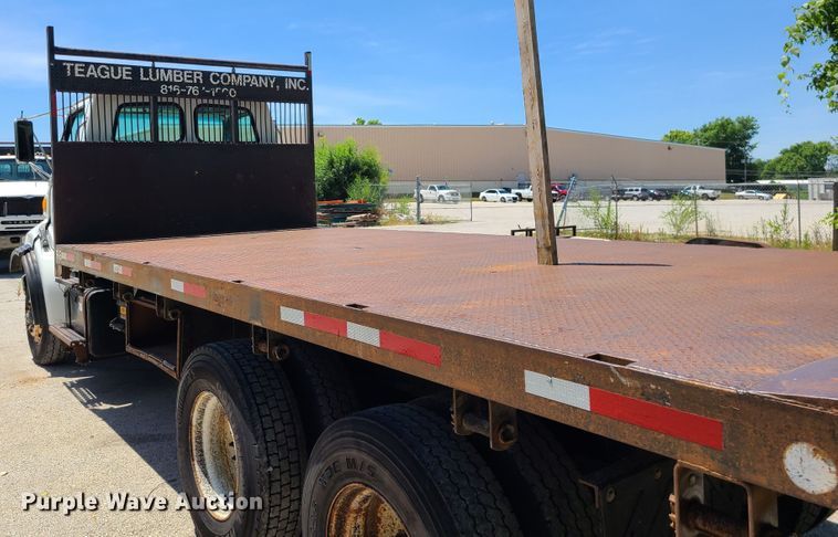 image for item JA9878 2004 Sterling L-Line  dump flatbed truck