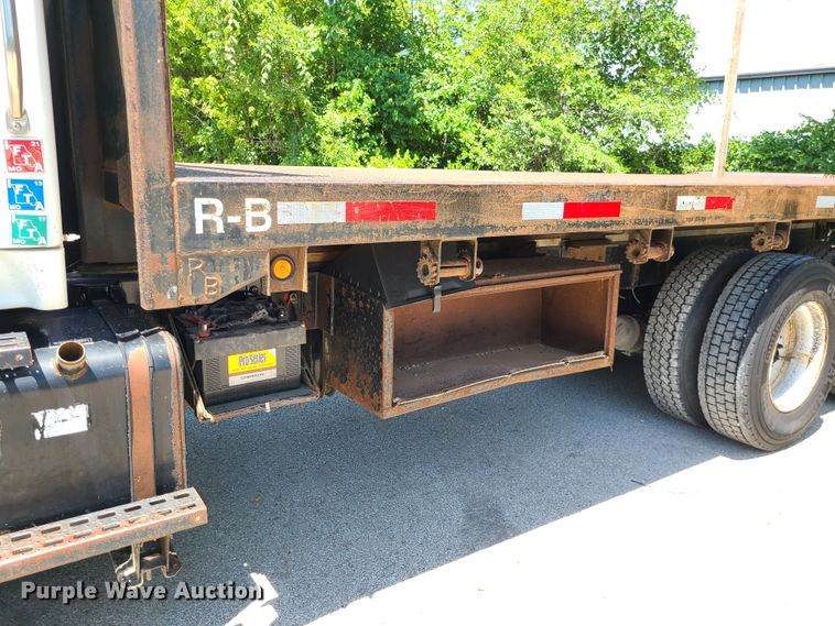 image for item JA9878 2004 Sterling L-Line  dump flatbed truck