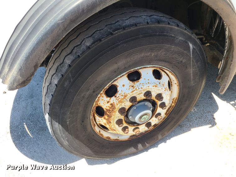 image for item JA9878 2004 Sterling L-Line  dump flatbed truck