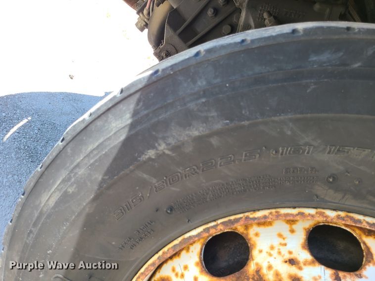 image for item JA9878 2004 Sterling L-Line  dump flatbed truck