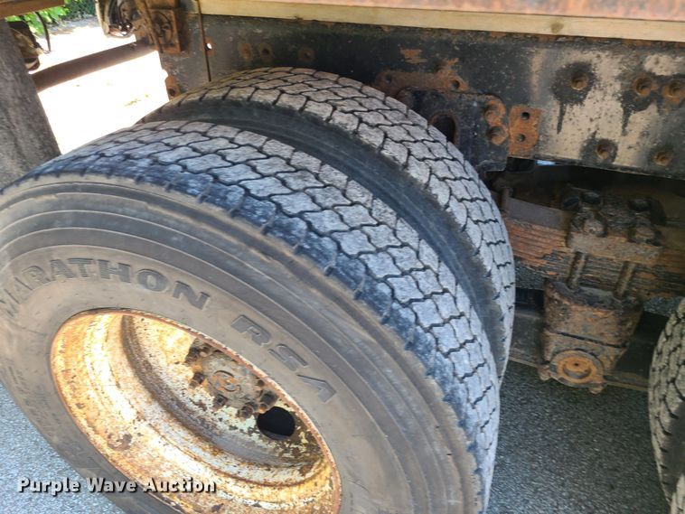 image for item JA9878 2004 Sterling L-Line  dump flatbed truck