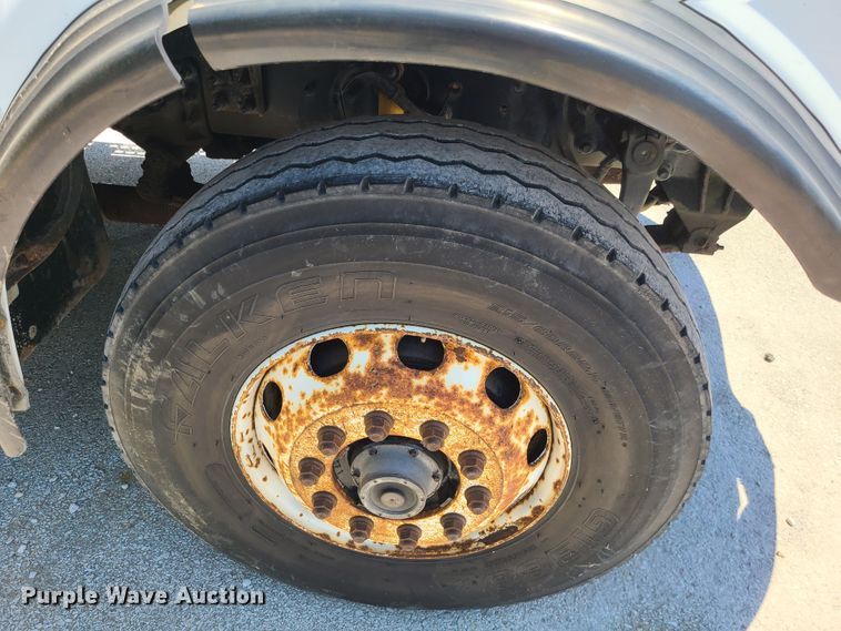 image for item JA9878 2004 Sterling L-Line  dump flatbed truck