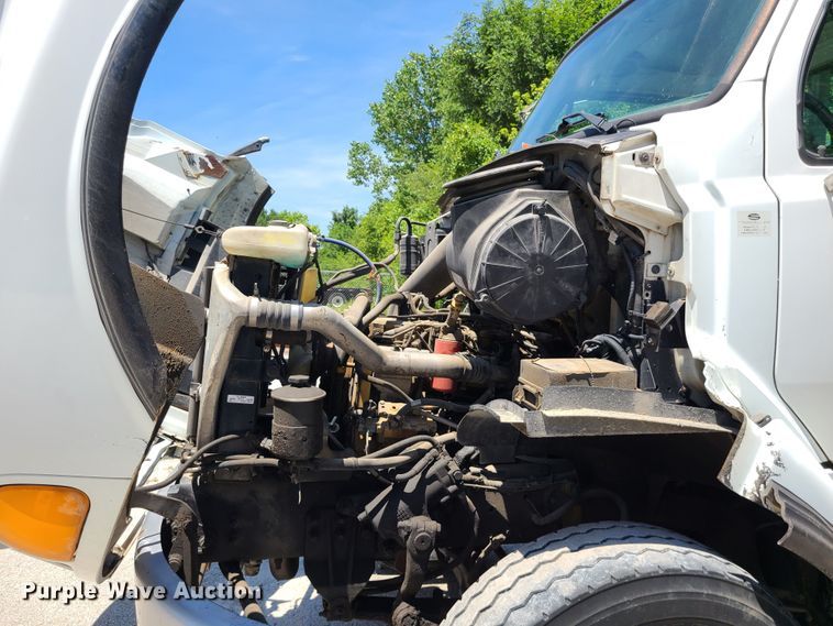 image for item JA9878 2004 Sterling L-Line  dump flatbed truck