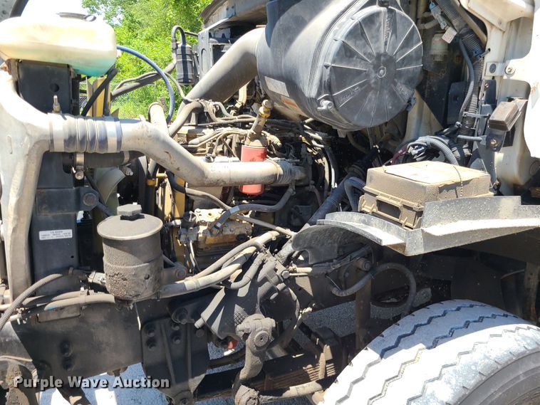 image for item JA9878 2004 Sterling L-Line  dump flatbed truck