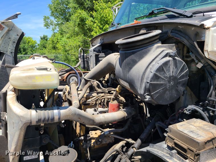 image for item JA9878 2004 Sterling L-Line  dump flatbed truck