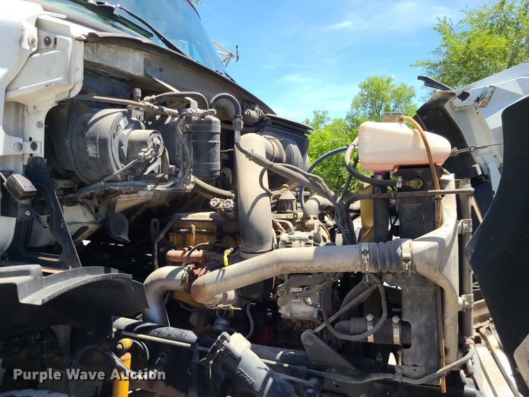 image for item JA9878 2004 Sterling L-Line  dump flatbed truck