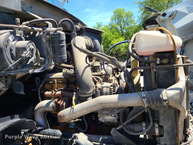 image for item JA9878 2004 Sterling L-Line  dump flatbed truck