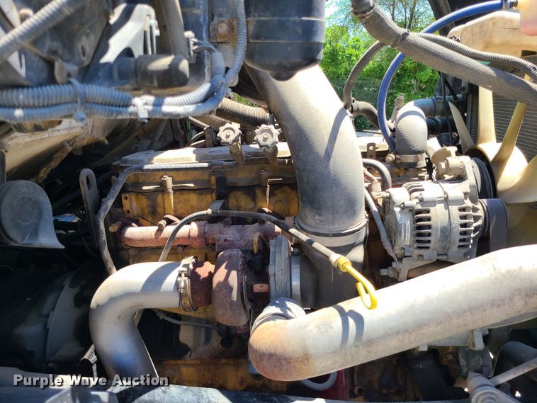 image for item JA9878 2004 Sterling L-Line  dump flatbed truck