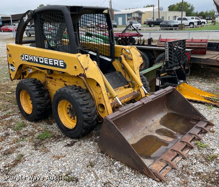 image for item MR9289 1999 John Deere 240  skid steer loader