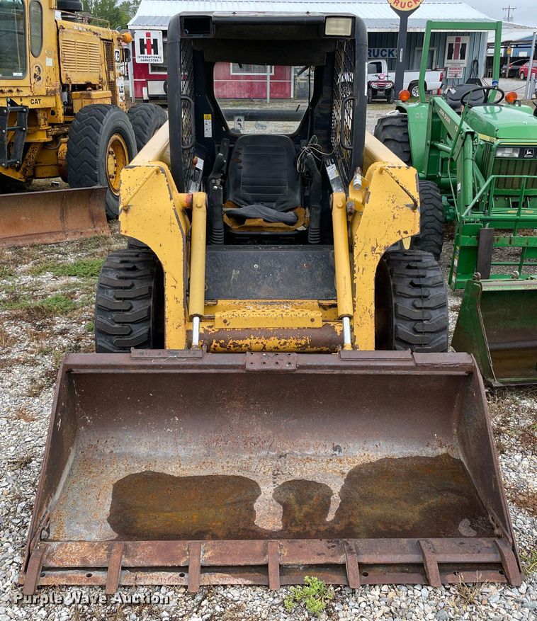 image for item MR9289 1999 John Deere 240  skid steer loader