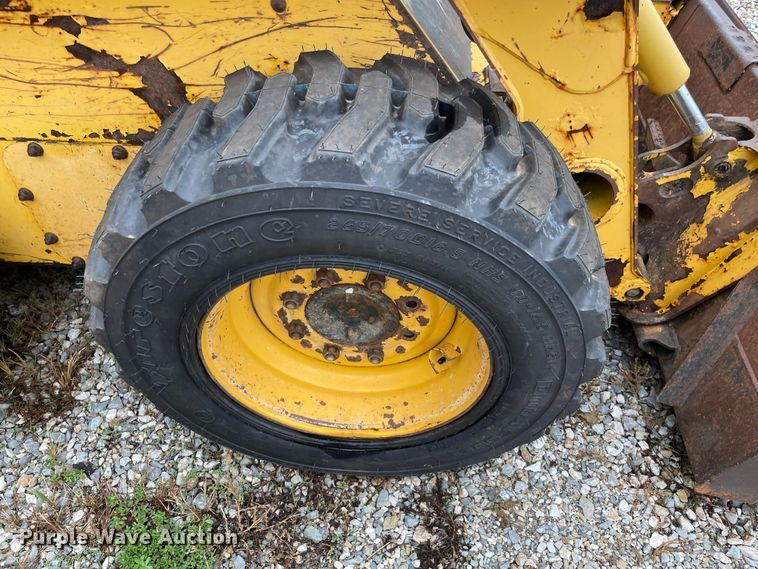 image for item MR9289 1999 John Deere 240  skid steer loader