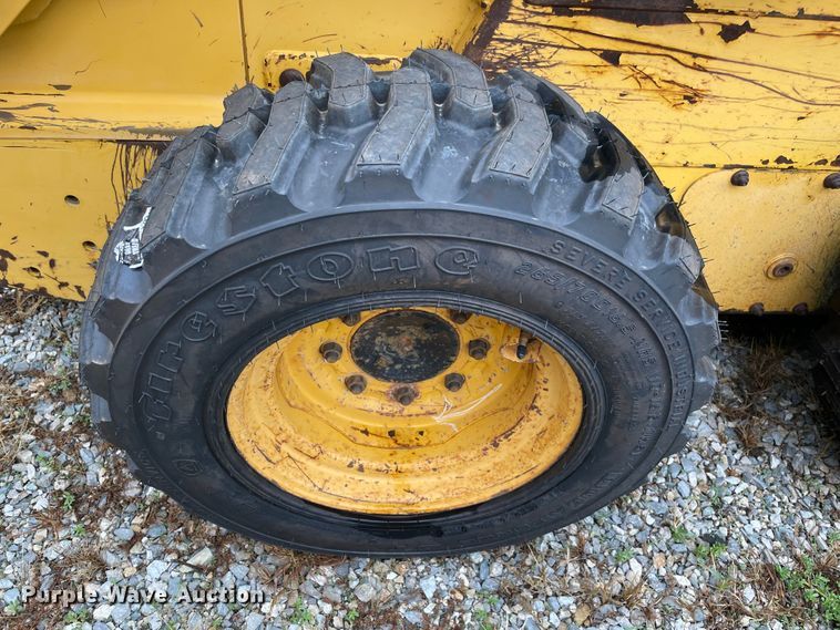 image for item MR9289 1999 John Deere 240  skid steer loader