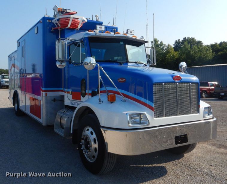 image for item DO1564 2004 Peterbilt 330  satelite broadcasting truck
