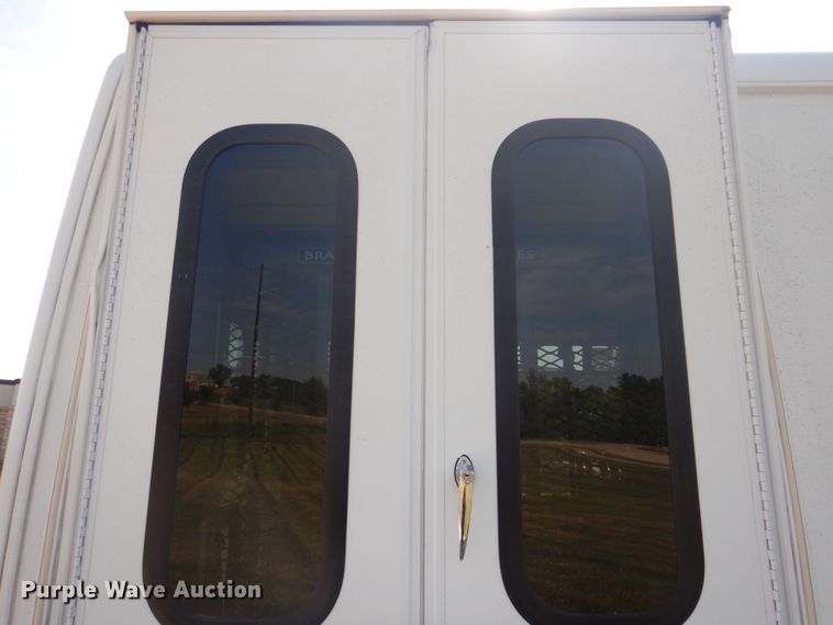 image for item DP0328 2011 Ford E450 Super Duty  shuttle bus