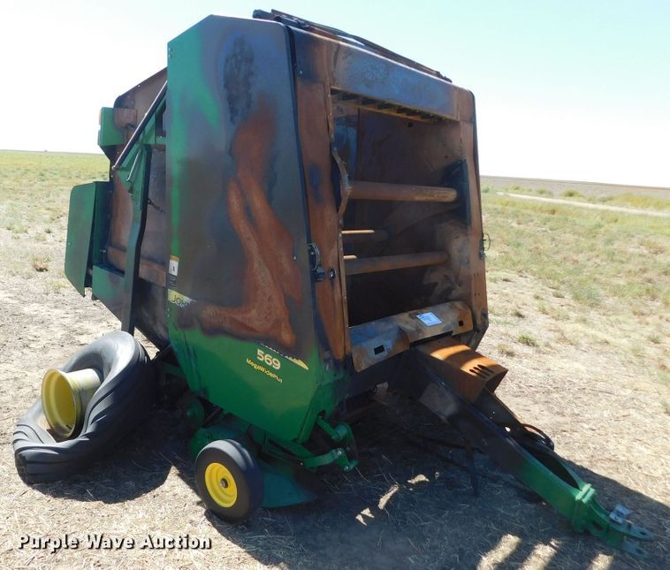 image for item DM2495 2012 John Deere 569  round baler